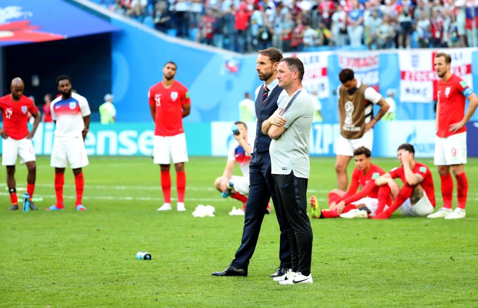  Southgate looks on as Belgium celebrate ending on a high