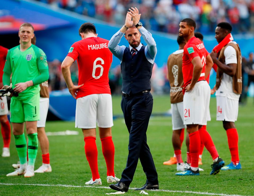  Southgate claps the fans as he walks round the pitch at full-time.