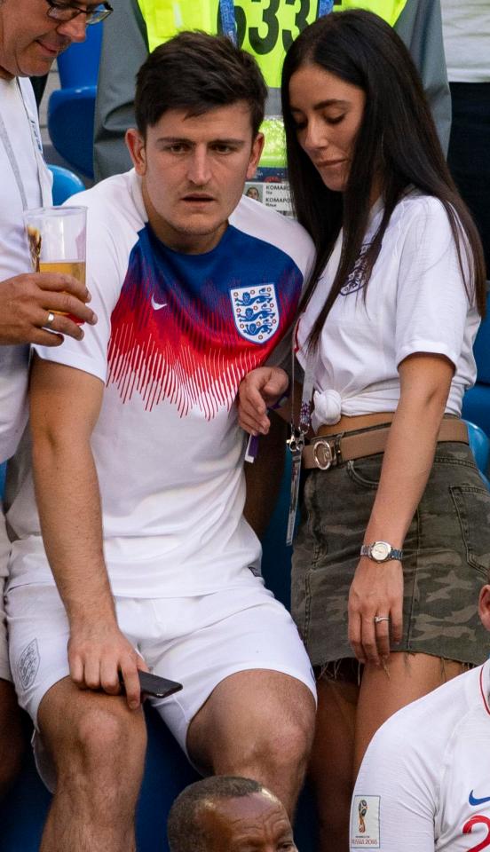  Maguire cuddled up to girlfriend Fern Hawkins following England's defeat