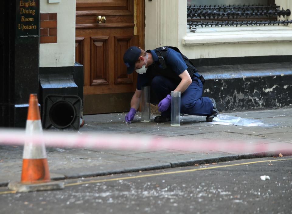  Police officers outside the cordoned-off pub The Westminster Arms, in London, where Steve Hedley was allegedly assaulted this afternoon