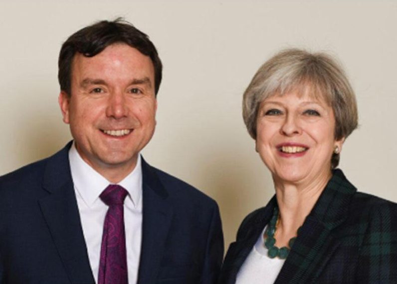  Shamed . . . ex-minister Andrew Griffiths with Theresa May