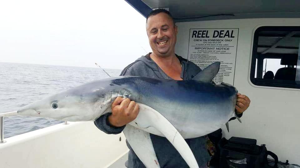  Dan Hawkins, who led the trip, with a Blue shark