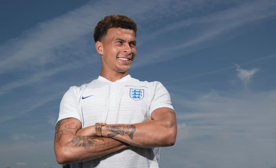  England midfielder Dele Alli poses for a picture before Tunisia clash