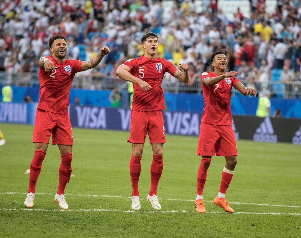  England players celebrate after knocking out Sweden in the quarter-finals