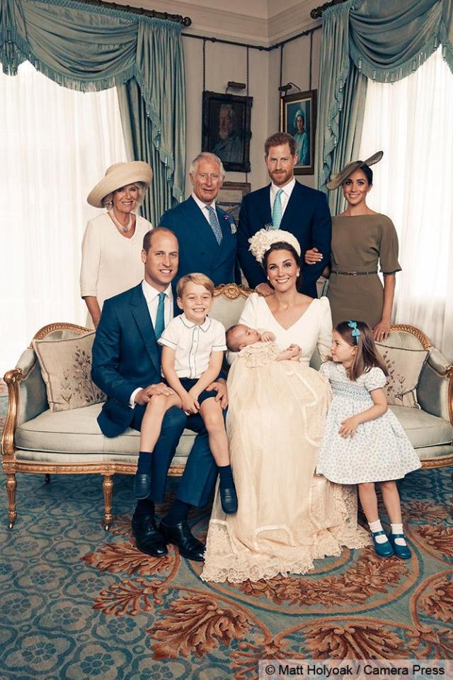  This shot captured the sweet moment Princess Charlotte gave her new brother the look of love and held his hand