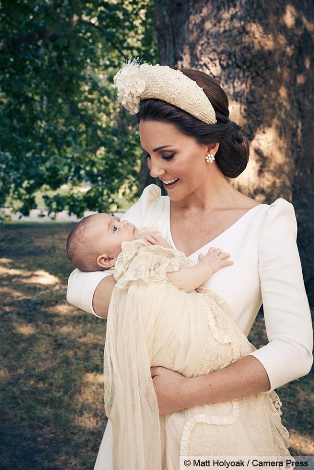  Proud mum Kate looks adoringly at her youngest son