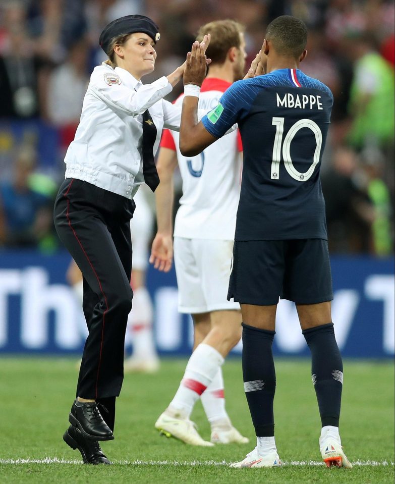  One pitch invader high-fived Kylian Mbappe after running on to the field of play in the World Cup final