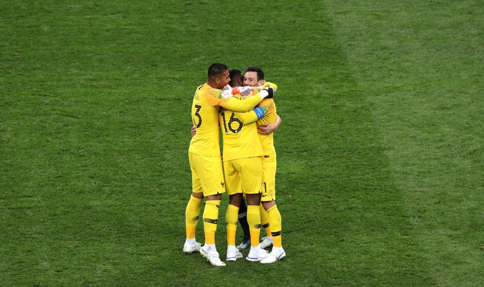  Hugo Lloris celebrates with Alphonse Areola and Steve Mandanda after the final whistle