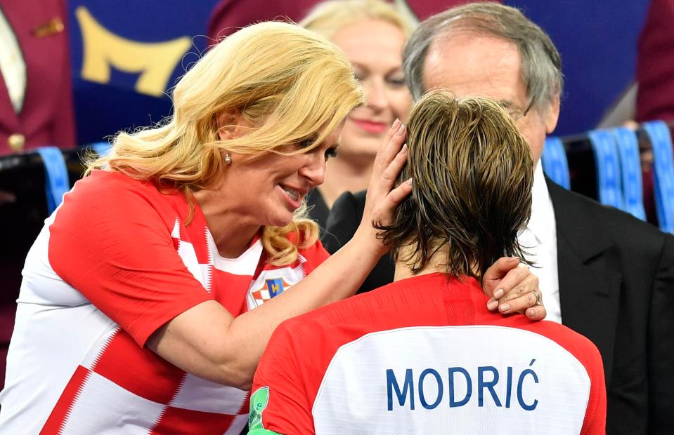  Croatia president Kolinda Grabar-Kitarovic consoles Croatia hero Luka Modric after World Cup final defeat