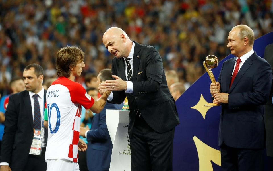  Fifa president Gianni Infantino congratulates Luka Modric on a fantastic World Cup