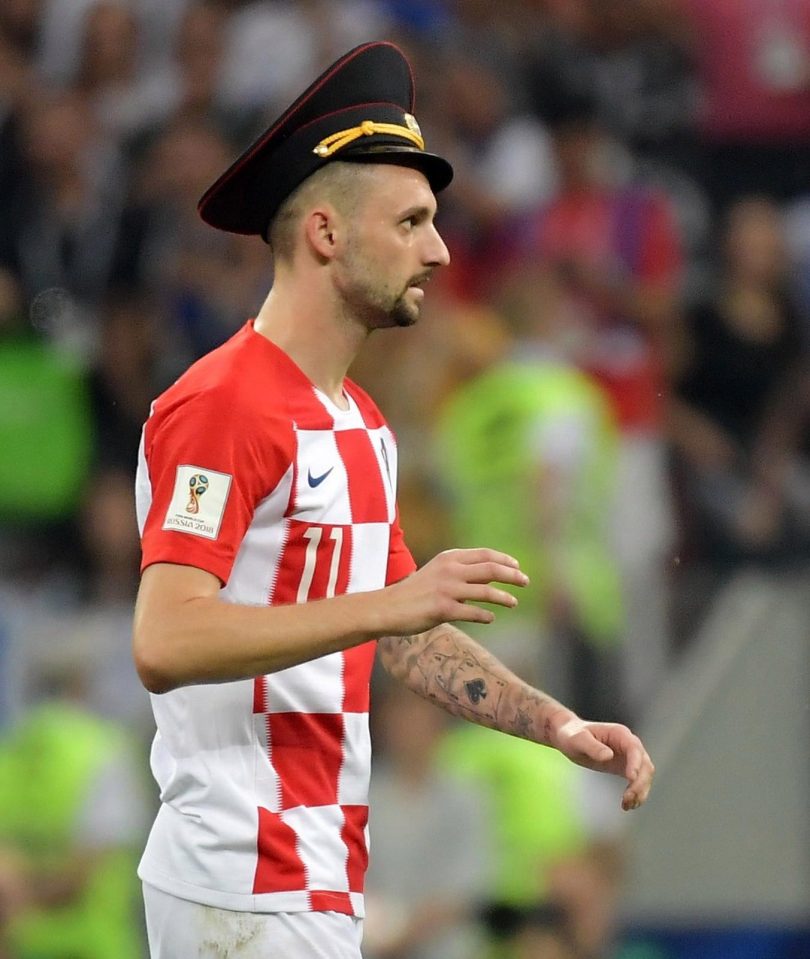  Marcelo Brozovic dons a Russian policemans cap worn by one of the memebers of Pussy Riot