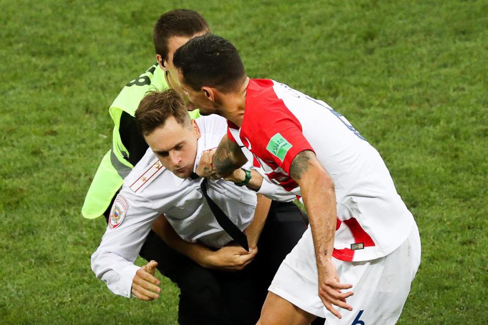  Dejan Lovren took exception to the pitch invaders as it disrupted a passage of play where Croatia had gained momentum