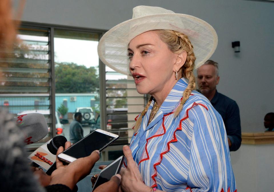  Madonna visits Malawi where four of her children are adopted from