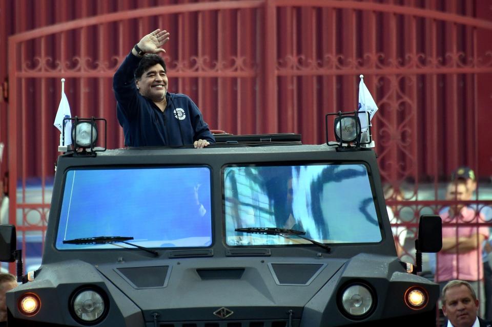  Diego Maradona rolled in in a massive truck on his first day in Belarus