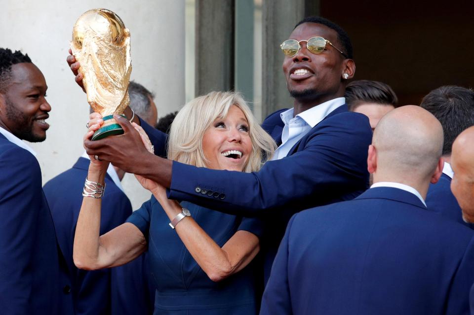  Pogba partied with Brigitte Macron, wife of French president Emmanuel Macron, at the official reception for the victorious squad in Paris