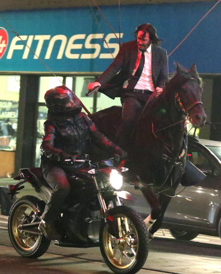  Keanu, 53, was seen riding a horse under an elevated train track in the borough of Brooklyn