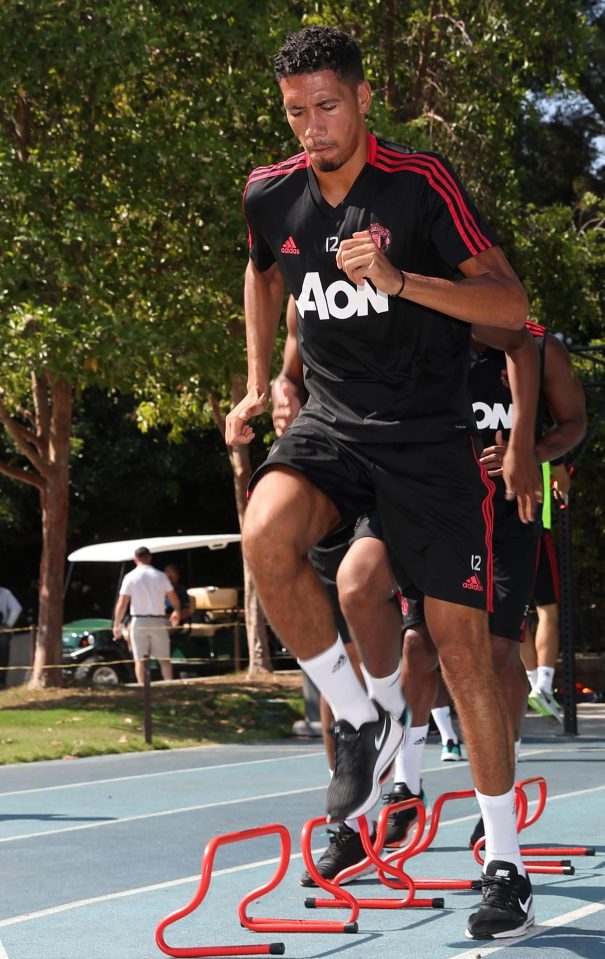  Chris Smalling hops over the mini hurdles after missing the England squad that finished fourth at the World Cup in Russia