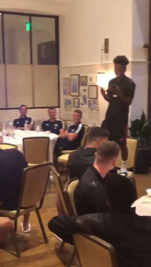  Angel Gomes delighted his team-mates before being pelted by napkins