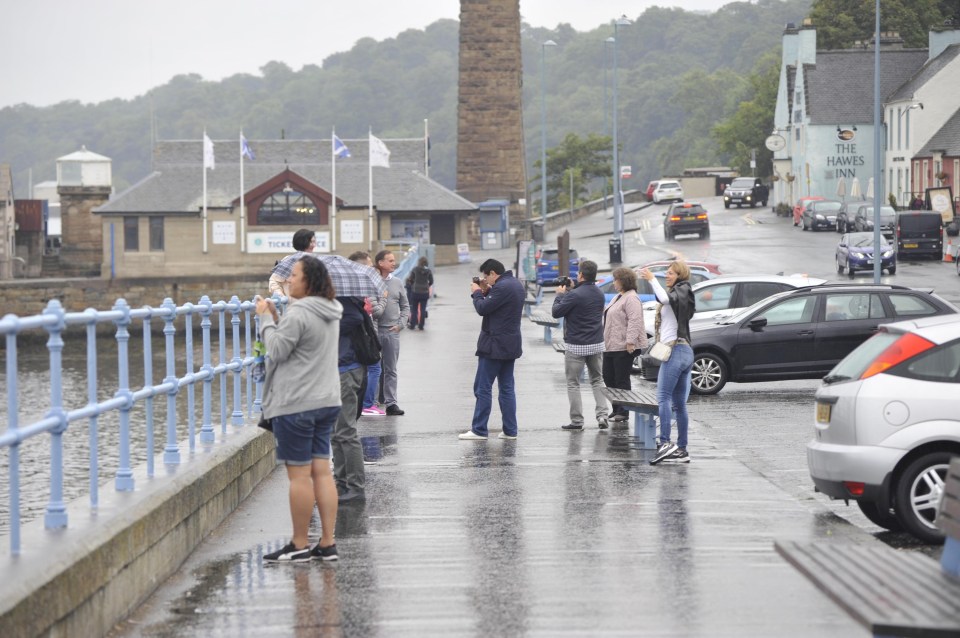 Wet weather struck South Queensferry in Scotland today – but the worst downpours are expected in the South East on Frantic Friday