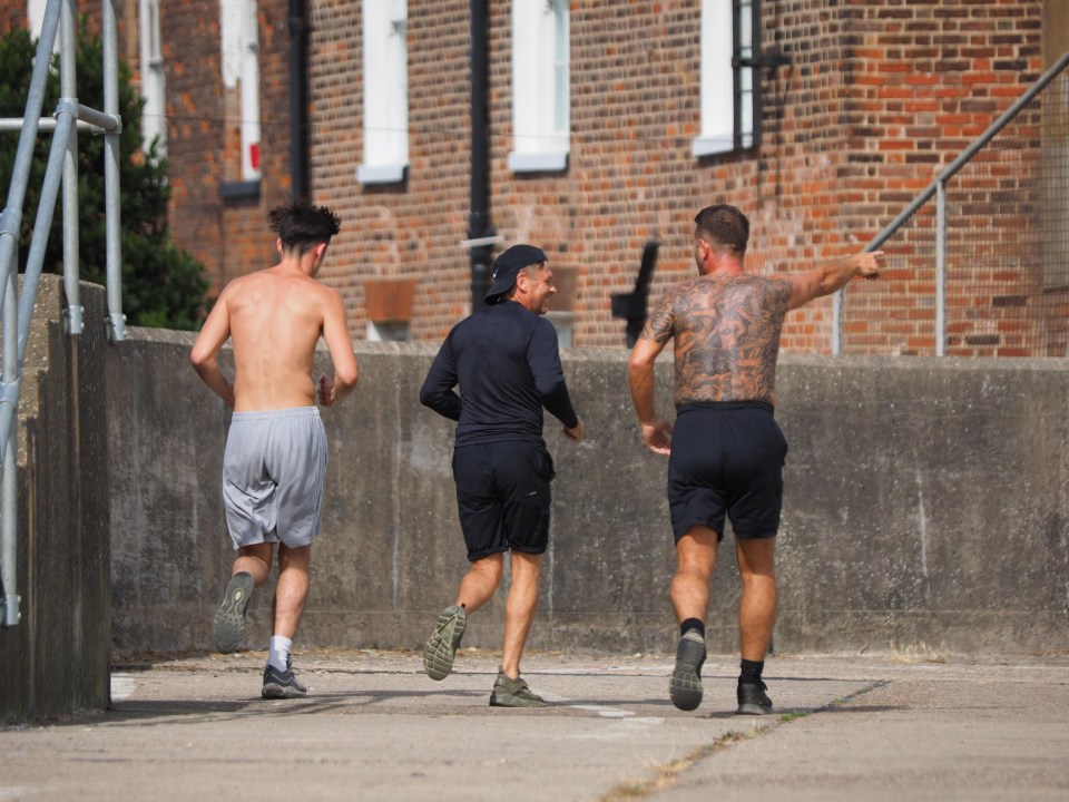 Joggers enjoy the warm weather in Sheerness, Kent