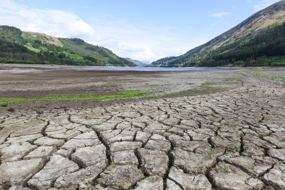 Cracked mud that is usually submerged in Thirlmere in the Lake District, Cumbria