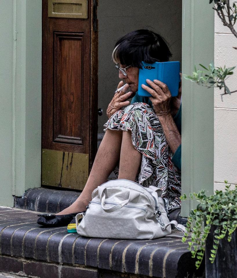  June made a call while perched in front of her London home