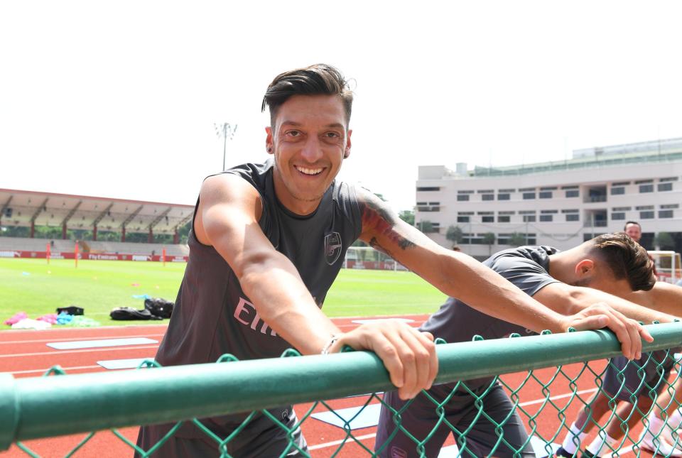  Mesut Ozil is delighted to finally be back with Arsenal