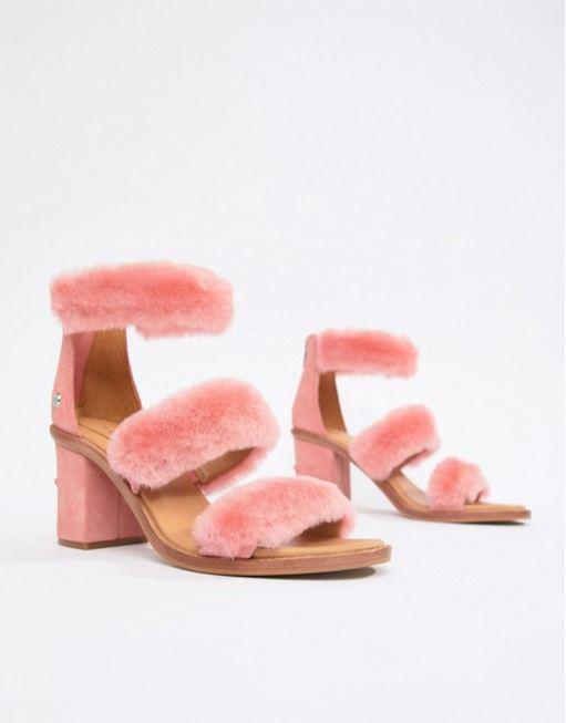  The fluffy heeled sandals are priced at £120