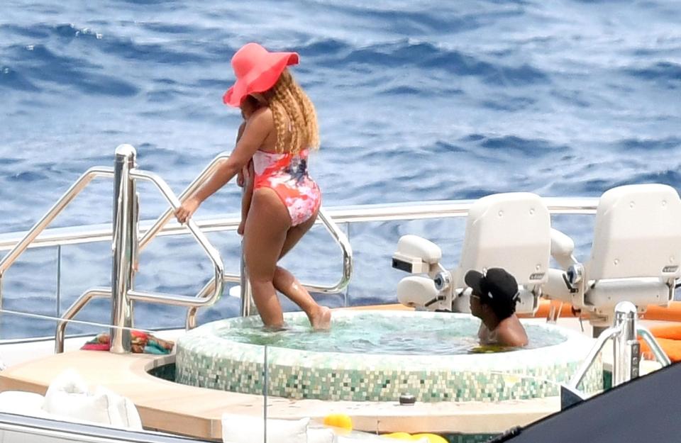  Bey then took her daughter out of the hot tub as Jay watched on