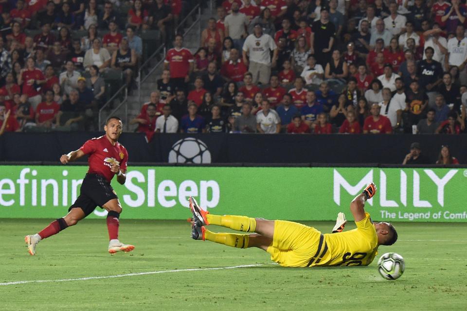  Alexis Sanchez slotted home the opening goal of the game at Stubhub Center