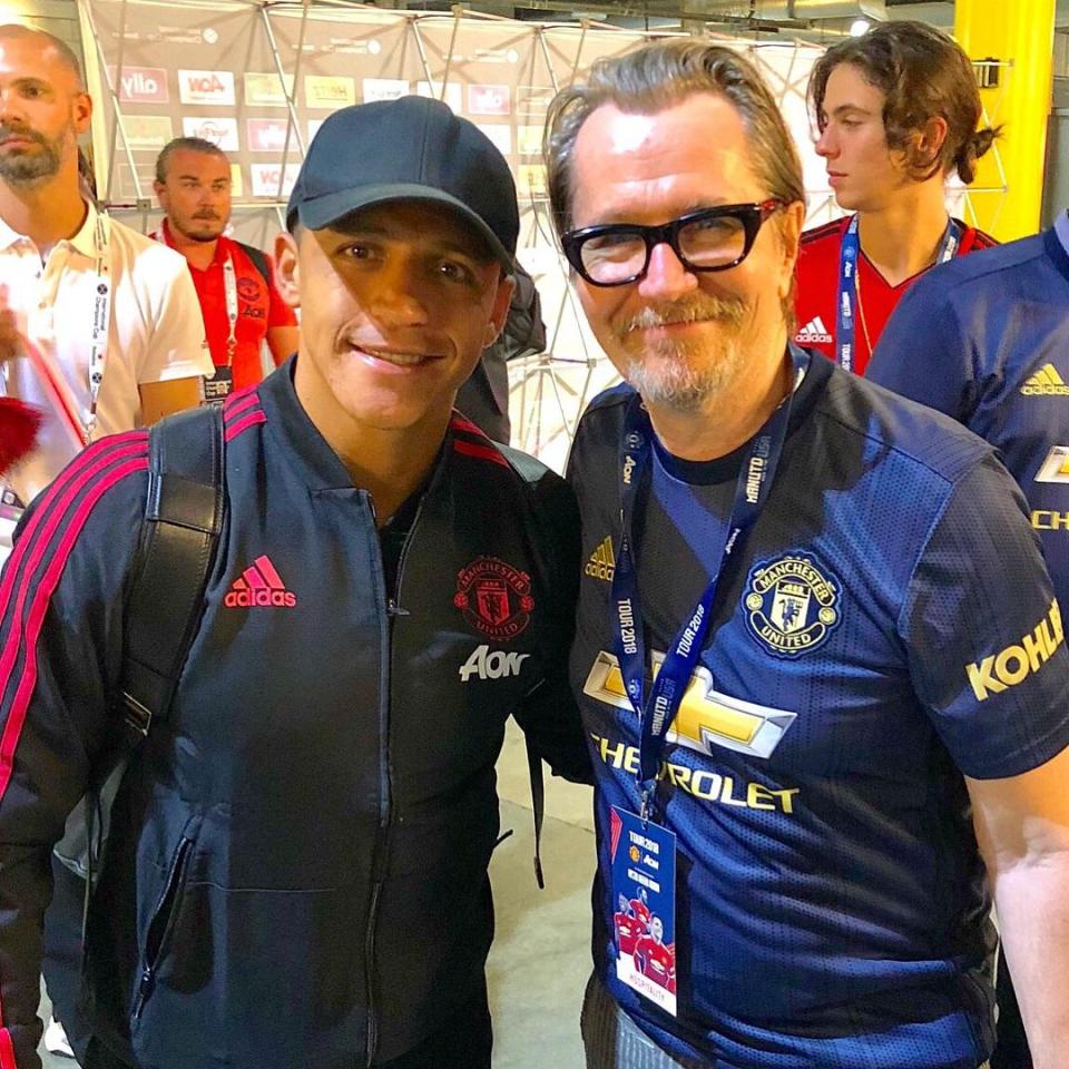  The Chilean striker was then joined for a photo with Manchester United fan and actor Gary Oldman