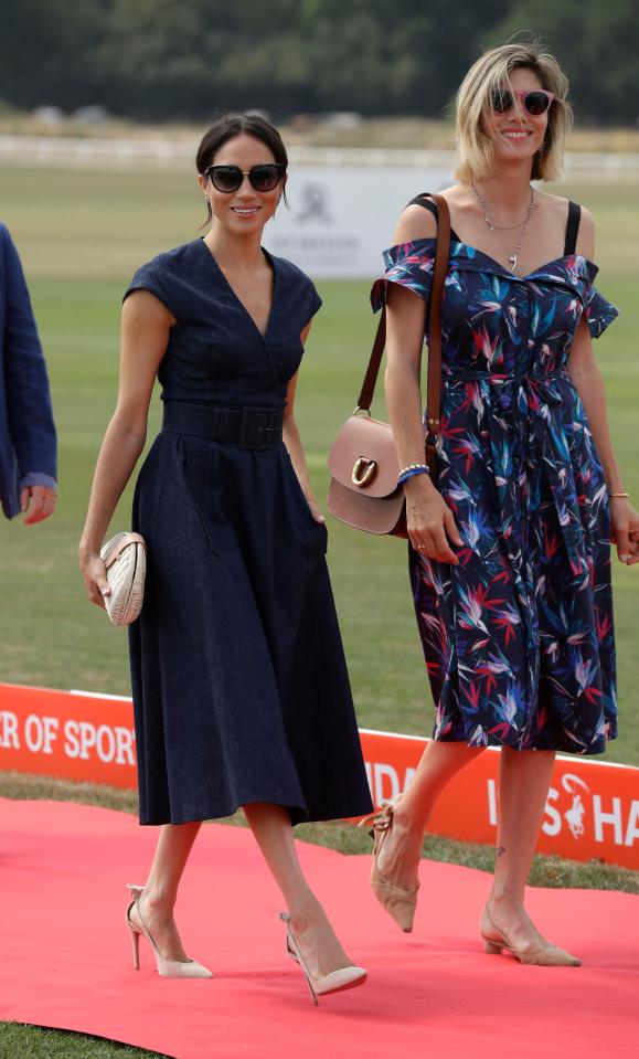  Meghan, Duchess of Sussex arrives with Delfina Blaquier, the wife of Nacho Figueras at the Royal County of Berkshire Polo Club in Windsor