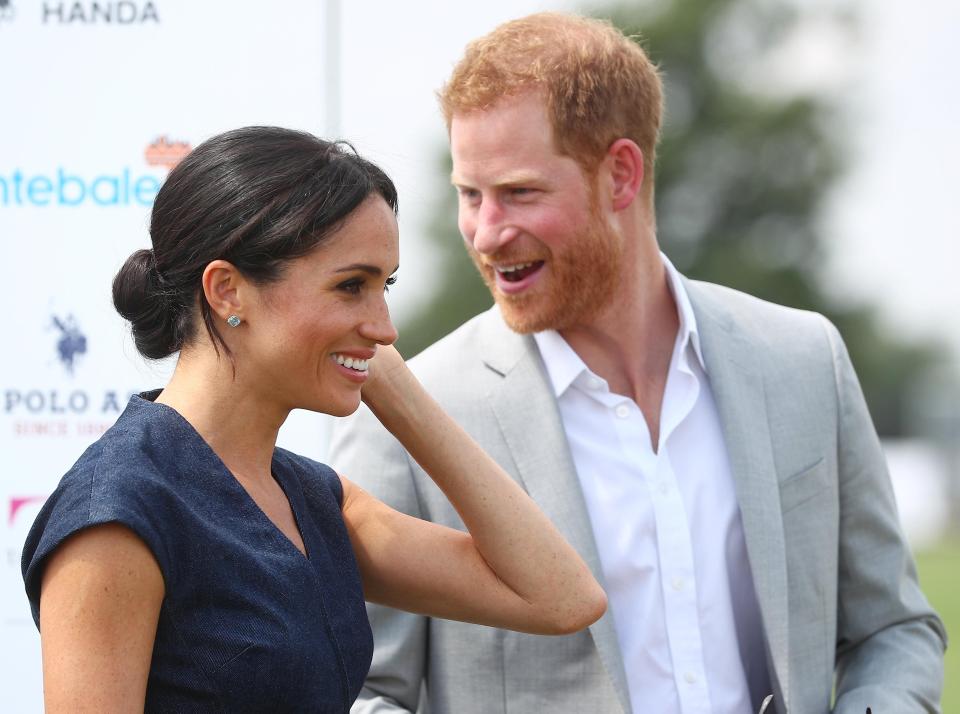  The happy newlyweds enjoy a day out at a charity polo match in Windsor