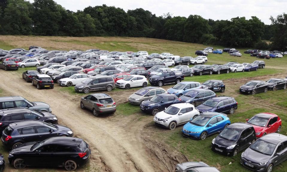  A field where customers' cars were parked. A judge said that Ms Khan treated her customers with 'utter contempt'