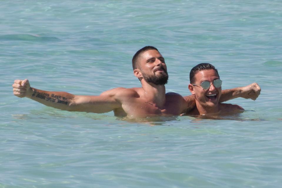  Giroud, sporting his new look, has been holidaying with Marseille's Florian Thauvin this summer