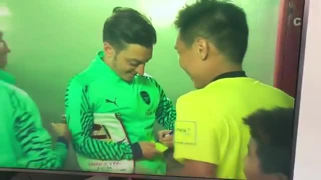  Mesut Ozil was asked for his autograph by a referee