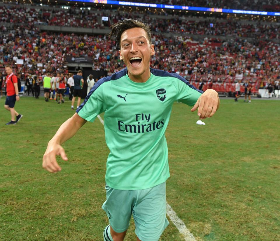  Ozil skippered the side in their 5-1 win over PSG