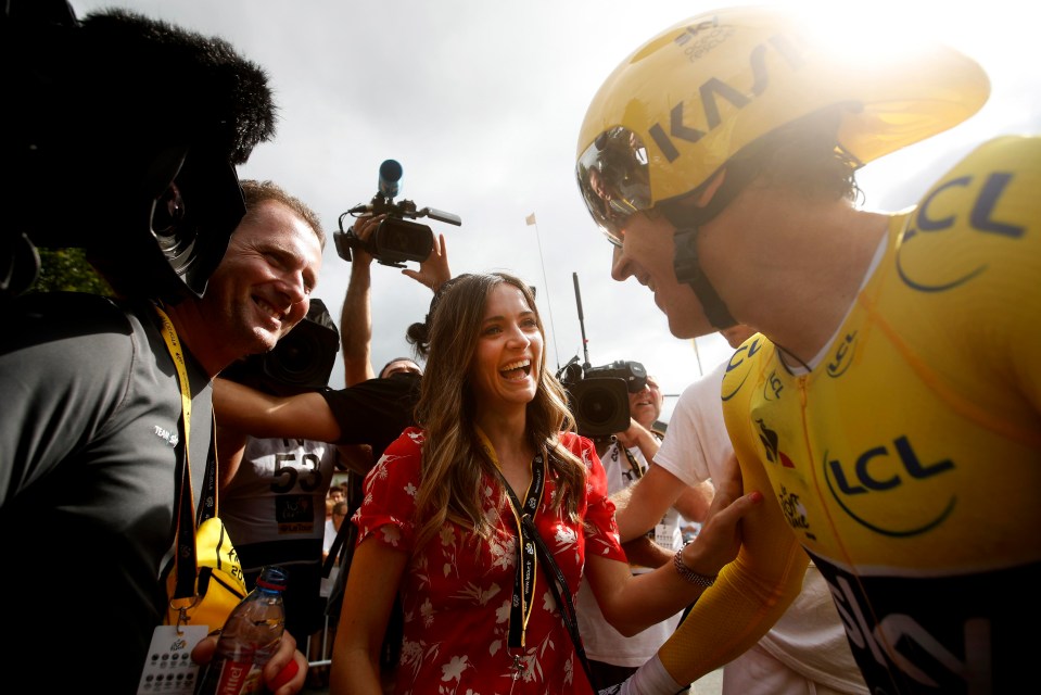 Sarah Elen Thomas celebrates with husband Geraint after the 20th stage of the Tour de France race