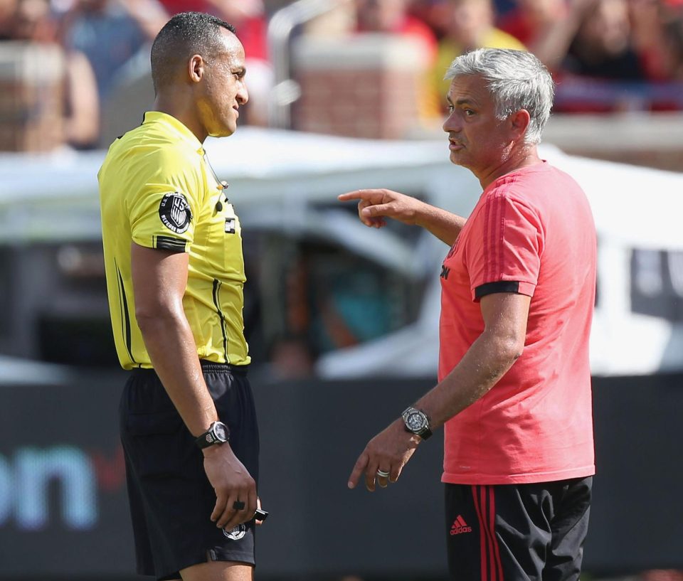  Jose Mourinho has a word with the referee