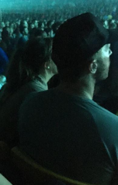  The couple appeared to dress down casually for the gig, with Chris opting for a trucker hat