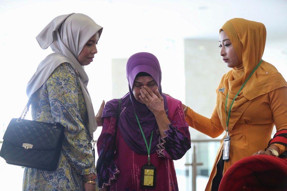 One of the relatives is seen crying while others claim the report does not offer any new information as to why the plane crashed