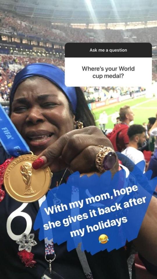  His mother has hold of his medal for safe-keeping