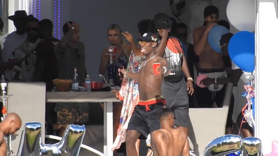  Pogba continues to celebrates Manchester United's World Cup win