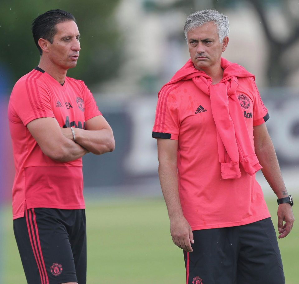  Manager Jose Mourinho and coach Emilio Alvarez look on stern faced during Manchester United training in Miami