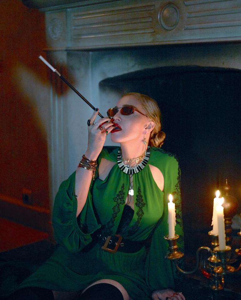  Madonna wearing flattering green dress in sultry pose