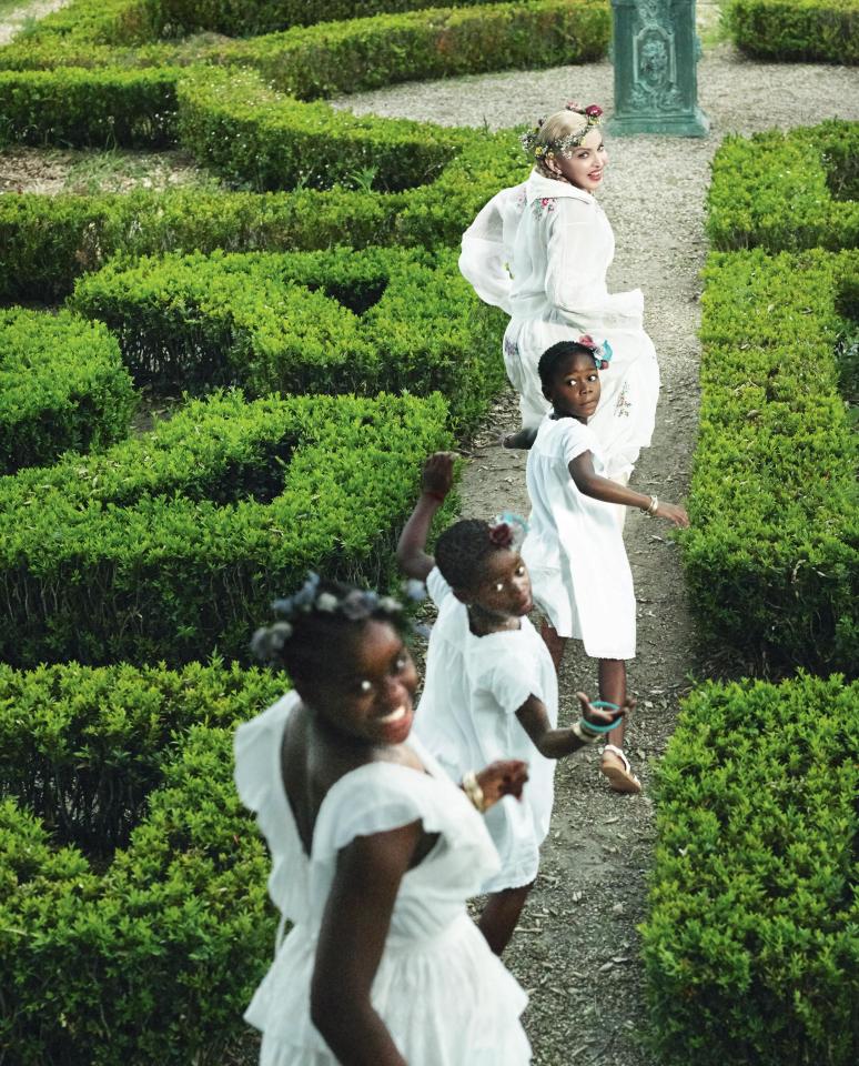  Madonna pictured with her four youngest children for Vogue Italia