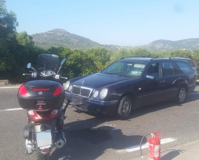  The battered Mercedes' licence plate was knocked off in the crash