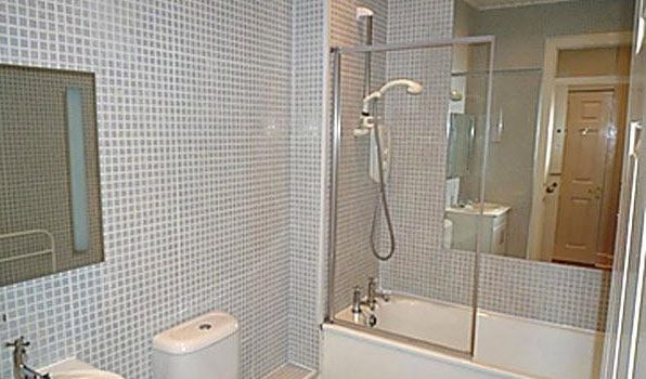  Pictures of show the same bathroom looked on the listing