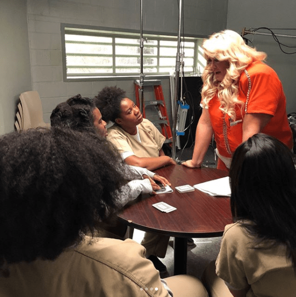  Adrienne C. Moore and Uzo Aduba stare up at Gemma Collins who seems to be giving them a lecture