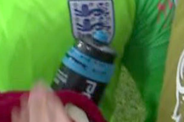  This zoomed-in image shows there was clearly writing of some sort on the neck of Jordan Pickford's water bottle